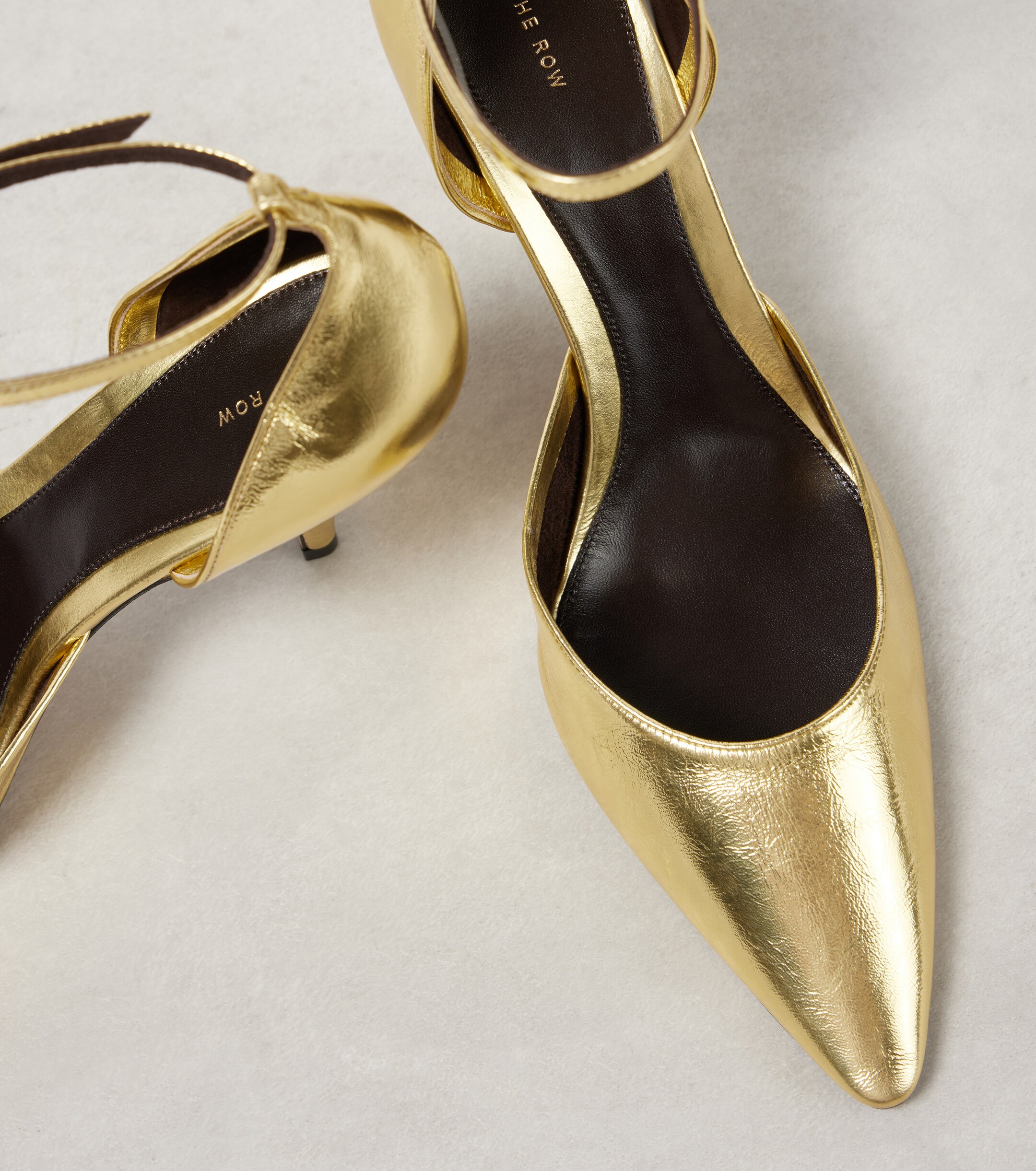 The Row Liisa metallic leather pumps