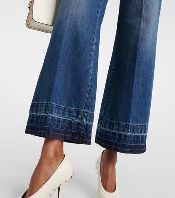 High-rise flared jeans in blue - Valentino | Mytheresa