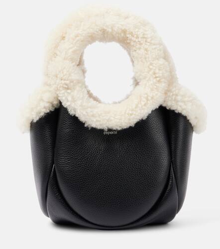 Swipe Mini faux fur-trimmed leather bucket bag - Coperni - Modalova