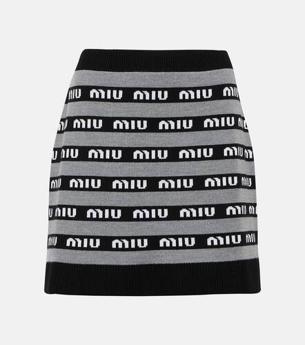 Logo jacquard wool miniskirt - Miu Miu - Modalova
