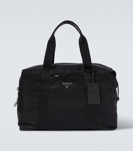 Re-Nylon leather-trimmed duffel bag - Prada - Modalova