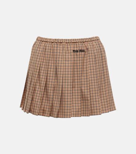 Minifalda de algodn plisada con logo - Miu Miu - Modalova
