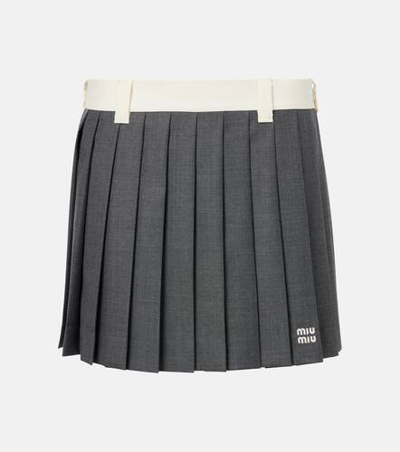 Pleated wool grisaille miniskirt - Miu Miu - Modalova