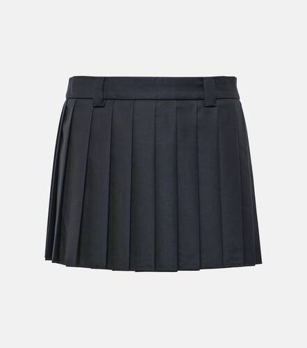 Pleated virgin wool miniskirt - Miu Miu - Modalova