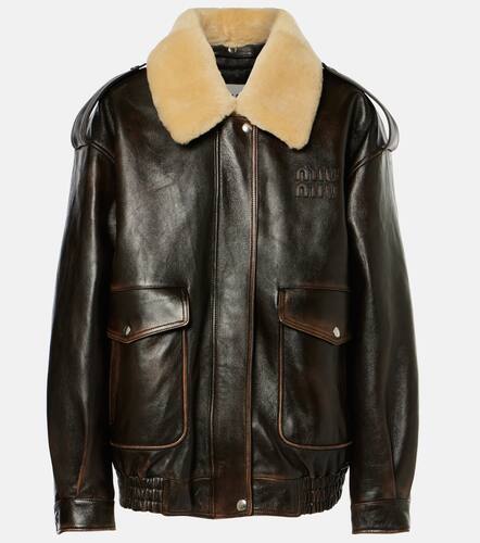 Logo faux shearling-trimmed leather jacket - Miu Miu - Modalova