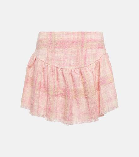 Mini-jupe Lively en tweed de laine mlange - LoveShackFancy - Modalova