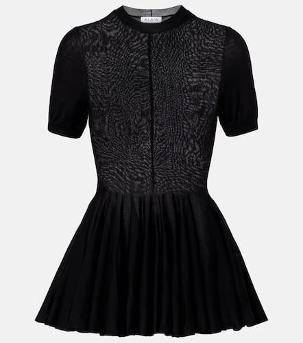 AlaÃ¯a Peplum virgin wool top - Alaia - Modalova