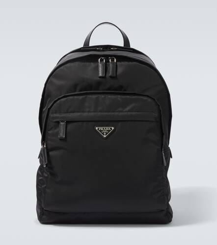 Re-Nylon leather-trimmed backpack - Prada - Modalova