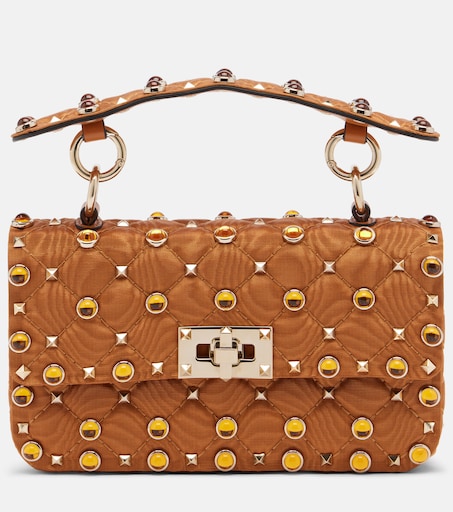 Rockstud Spike Small moiré top-handle bag in brown - Valentino