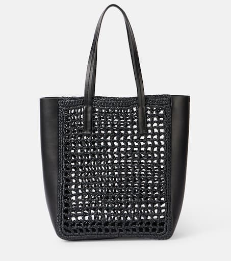 Zoe Small leather-trimmed raffia tote bag in black - Khaite