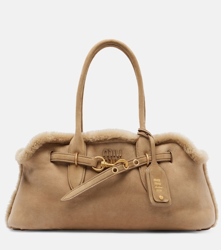 Adventure shearling-lined suede tote bag in beige - Miu Miu