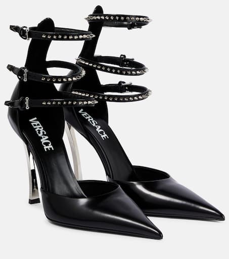 Pin-Point embellished leather pumps in black - Versace