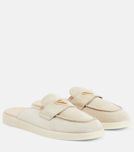 Logo suede slippers in beige - Prada | Mytheresa