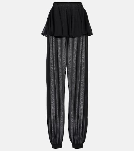 Mid-rise semi-sheer wide-leg pants in black - Alaia | Mytheresa