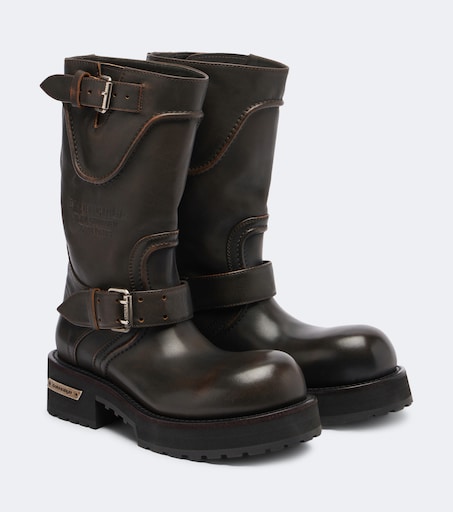 Venom debossed leather boots