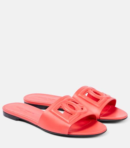 Logo leather slides in orange - Dolce Gabbana | Mytheresa