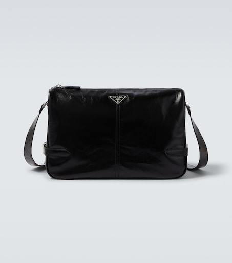 バッグ PRADA leather messenger bag black Leather shoulder bag in black - Prada | Mytheresa