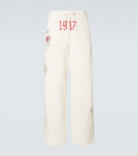Printed cotton fleece sweatpants in white - Balenciaga | Mytheresa