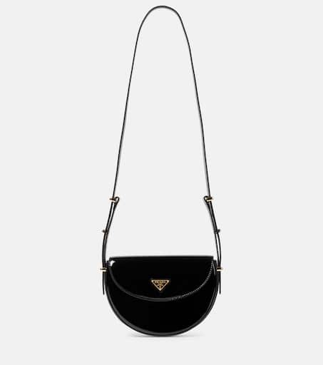 Arqué leather shoulder bag in black - Prada | Mytheresa