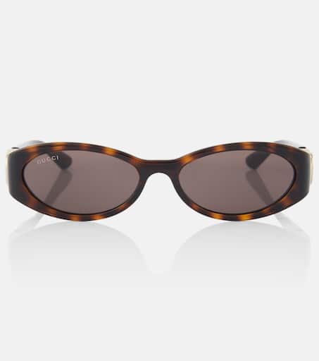 Interlocking G oval sunglasses in brown - Gucci | Mytheresa