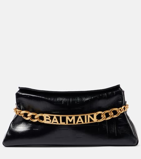 【送料&関税込】Balmain Sergeant - Black Rhodium / Leather B 1945 PB embossed leather clutch in black - Balmain | Mytheresa