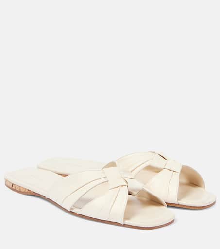 サンダル・ミュール The Row Soft Knot leather slides Soft Knot leather slides in white - The Row | Mytheresa