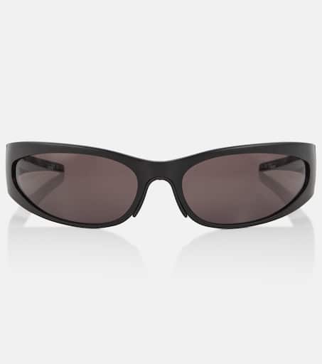 Reverse Xpander oval sunglasses in black - Balenciaga