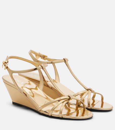 Metallic leather wedge sandals in gold - Prada | Mytheresa