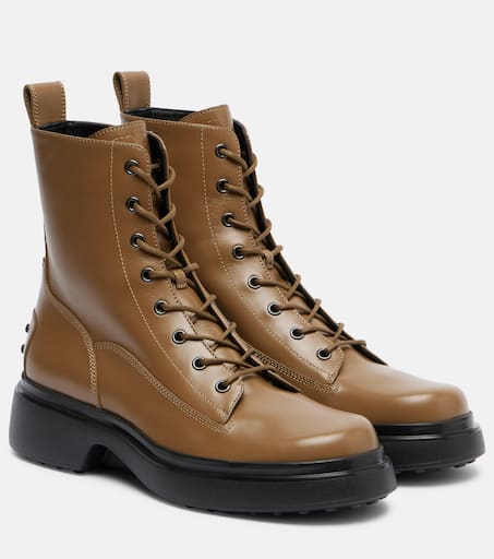 Leather combat boots in brown - Tods | Mytheresa
