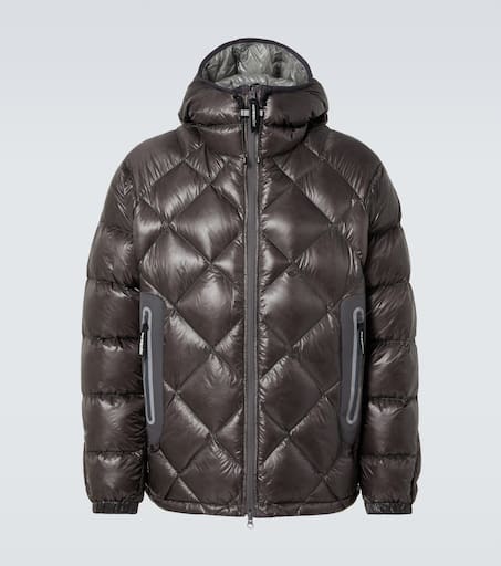 Quilted down jacket in grey - And Wander | Mytheresa