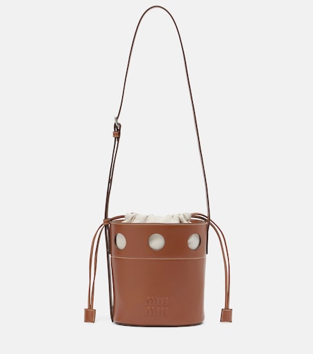 Perforated leather bucket bag in brown - Miu Miu | Mytheresa