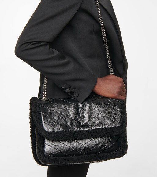 Saint Laurent - Borsa Niki Medium in pelle e shearling | Mytheresa