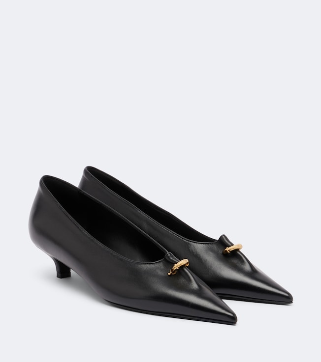 TOTEME Pierced embellished leather pumps