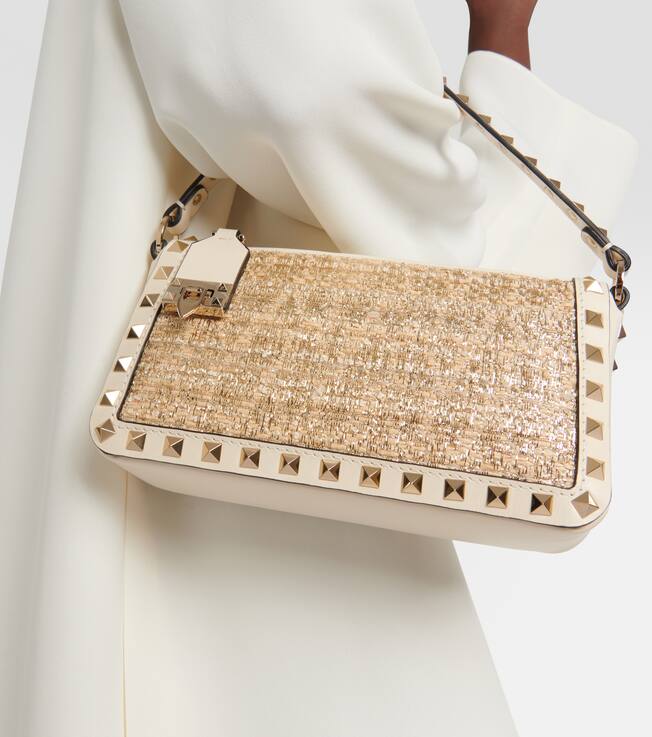 Rockstud Small leather-trimmed crossbody bag | Valentino Garavani